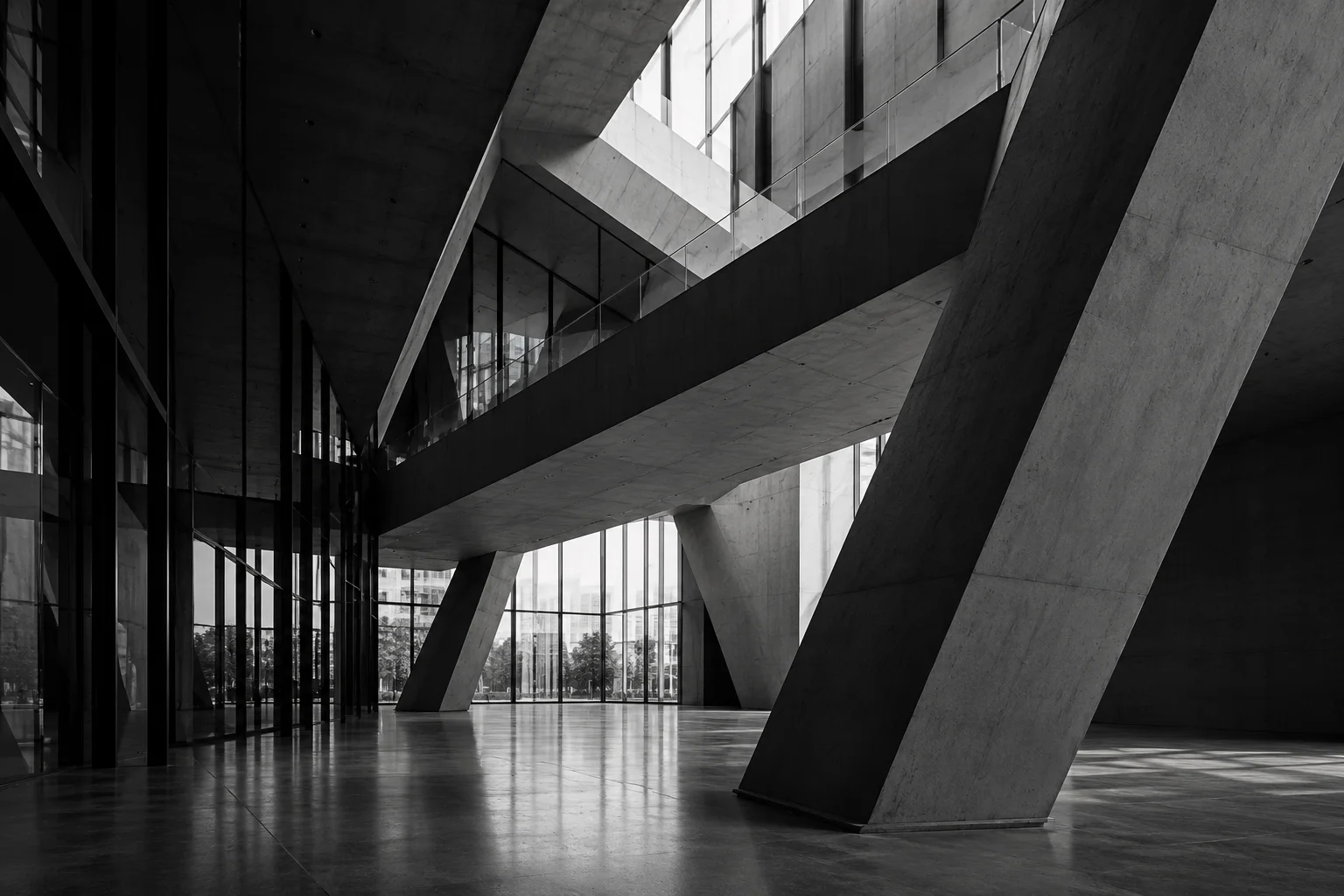 Intersecting structural beams and glass in a contemporary architectural space